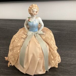 Antique Porcelain half doll historical charm collectible from the 20th Century